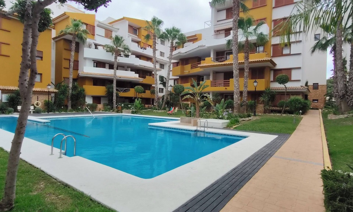 Punta Prima Apartment | Apartment in La Recoleta Punta Prima, Communal pools and steps away from the sea