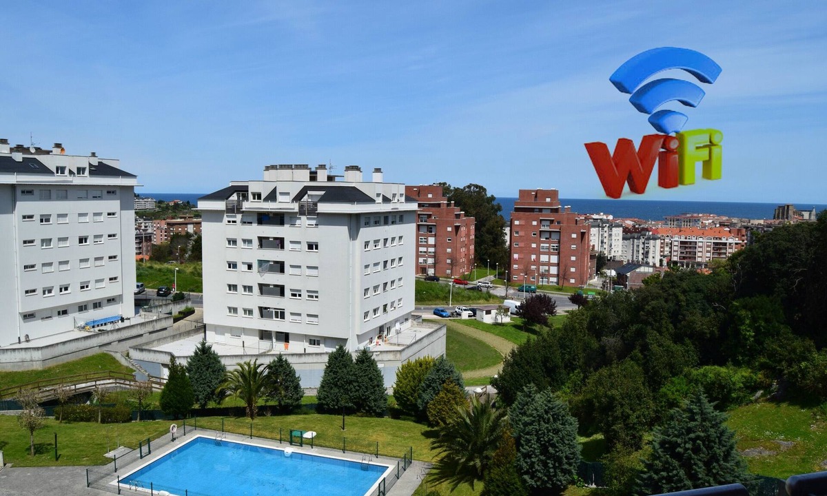 Castro Urdiales Apartment | Apartment with 2 Terraces, Sea Views, Pool, and Garden