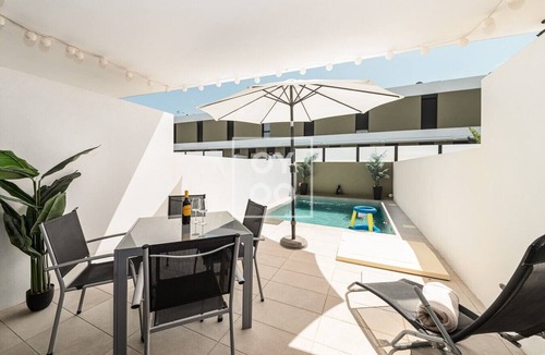 Pilar de la Horadada House | Coastal Calm Townhouse, Private pool and beach ready at Pilar, by OYOOSTAYS