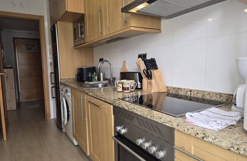 Los Alcazares Condo | Enjoy a comfortable stay in this cozy apartment. Ideal for up to 3 guests, it features 1 bed, 1 sofa bed, WiFi, a living room with TV, a dining area, and a fully equipped kitchen. The complex also offers a shared swimming pool and on-site parking for you