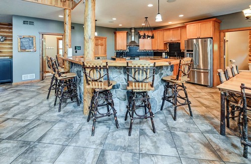Mauston House | Experience luxurious lakeside living in our 5-bed, 5-bath retreat!