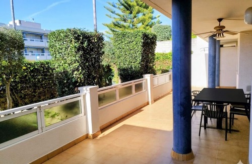 Tamarit Apartment | Large terrace, with garden. Pool and near the beach