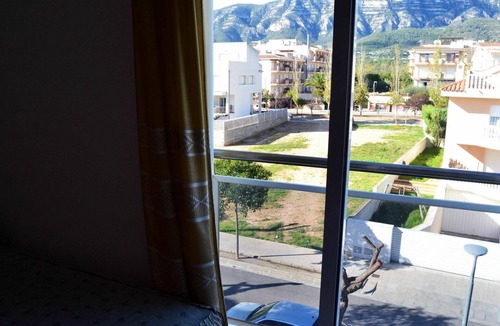 Sant Carles de la Rapita Apartment | Lovely apartment for 6 people with pool, TV and balcony