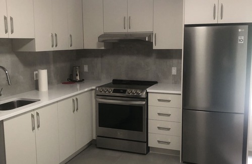 Pointe Claire Apartment | Peaceful oasis near airport private entrance.