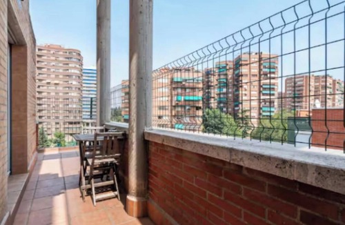 San Pascual Apartment | Stylish Duplex Penthouse with Private Terraces in Ciudad Lineal