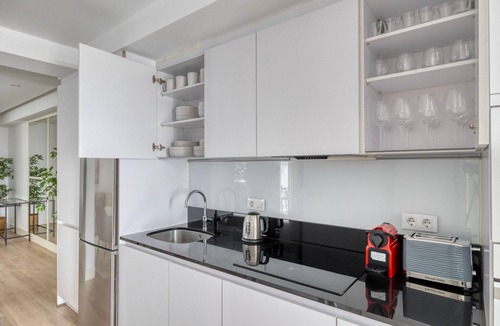 Justicia Apartment | Sunny Malasaña 3BR w/Doorman, nr Shopping, by Blueground
