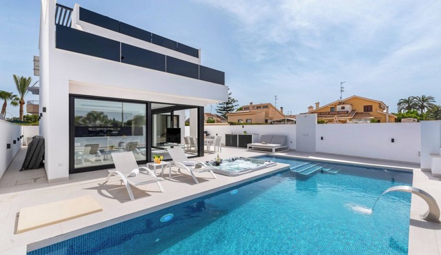 Luxury Villa Adela | Pool, 2 Jacuzzi’s & Rooftop Terrace suitable for 8 guests.
