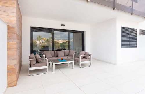 Mil Palmeras Apartment | Apartment in Mil Palmeras with Sea View, Pool, Garden, Terrace, A/C & Wi-Fi