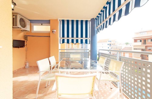 Canet de Berenguer Apartment | Global Vacacional: Apartment with pool and terrace in Canet beach