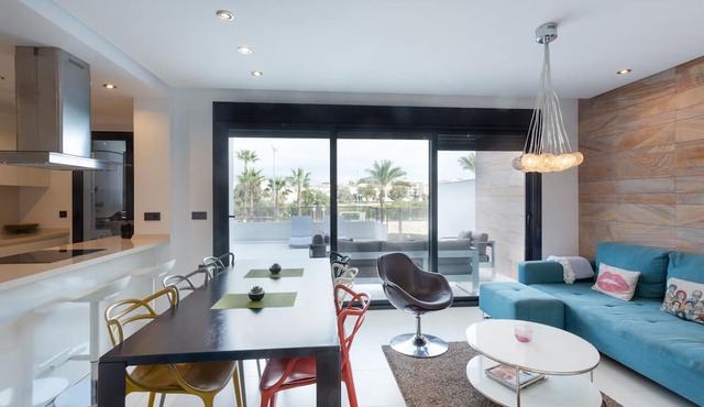 Apartment in Mil Palmeras with Sea View, Pool, Garden, Terrace, A/C & Wi-Fi