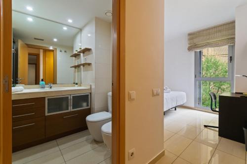 Fira Suites - Habitaciones privadas en Apartamento compartido